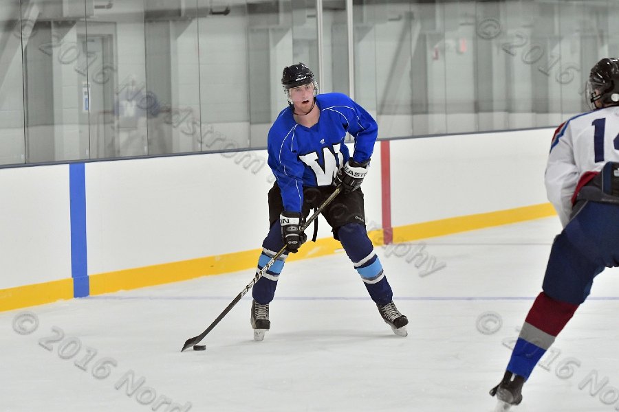 Wheaton College Men\'s Ice Hockey vs Middlesex Community College. - Photo By: KEITH NORDSTROM